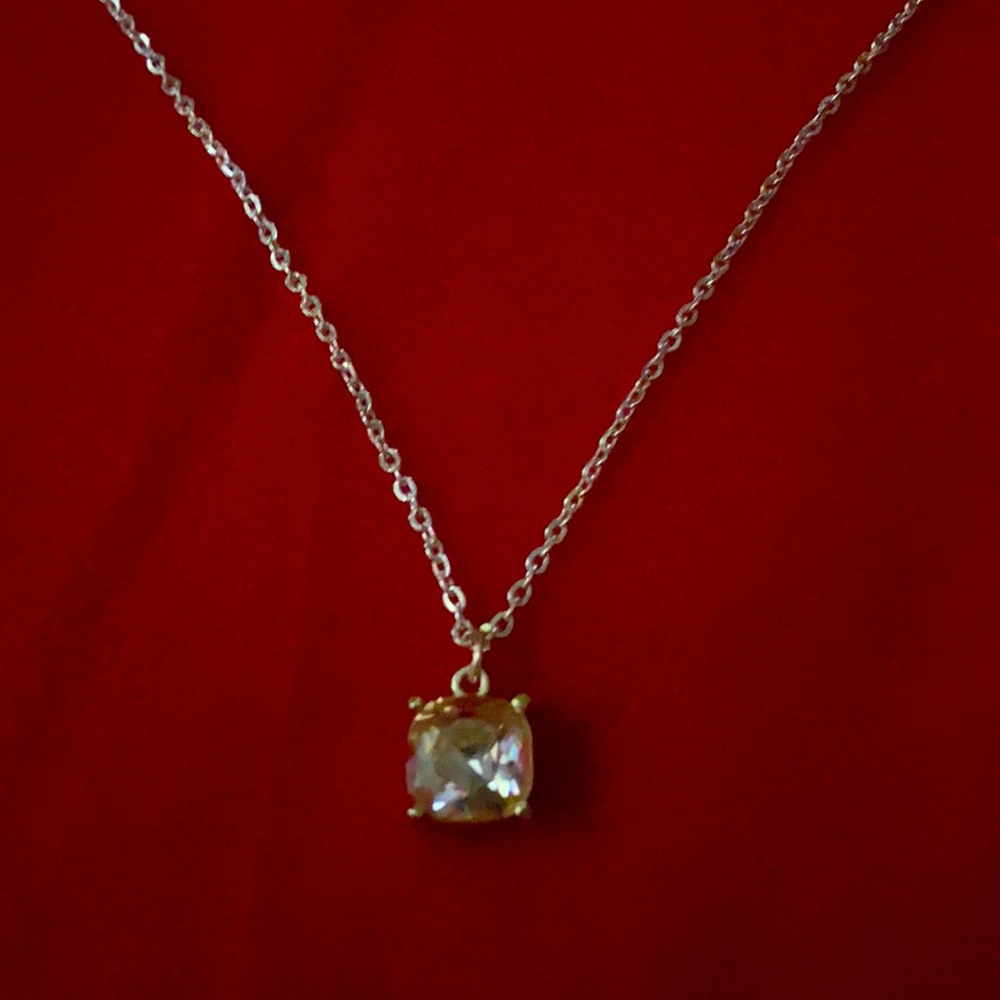 Champagne color stone charm necklace.